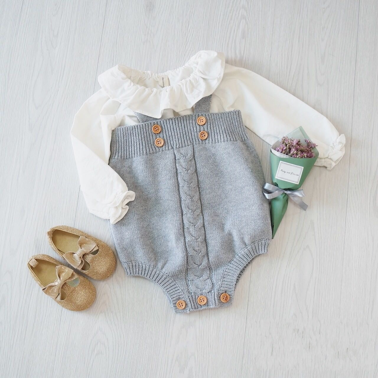 Hand-Knitted Baby Onesie