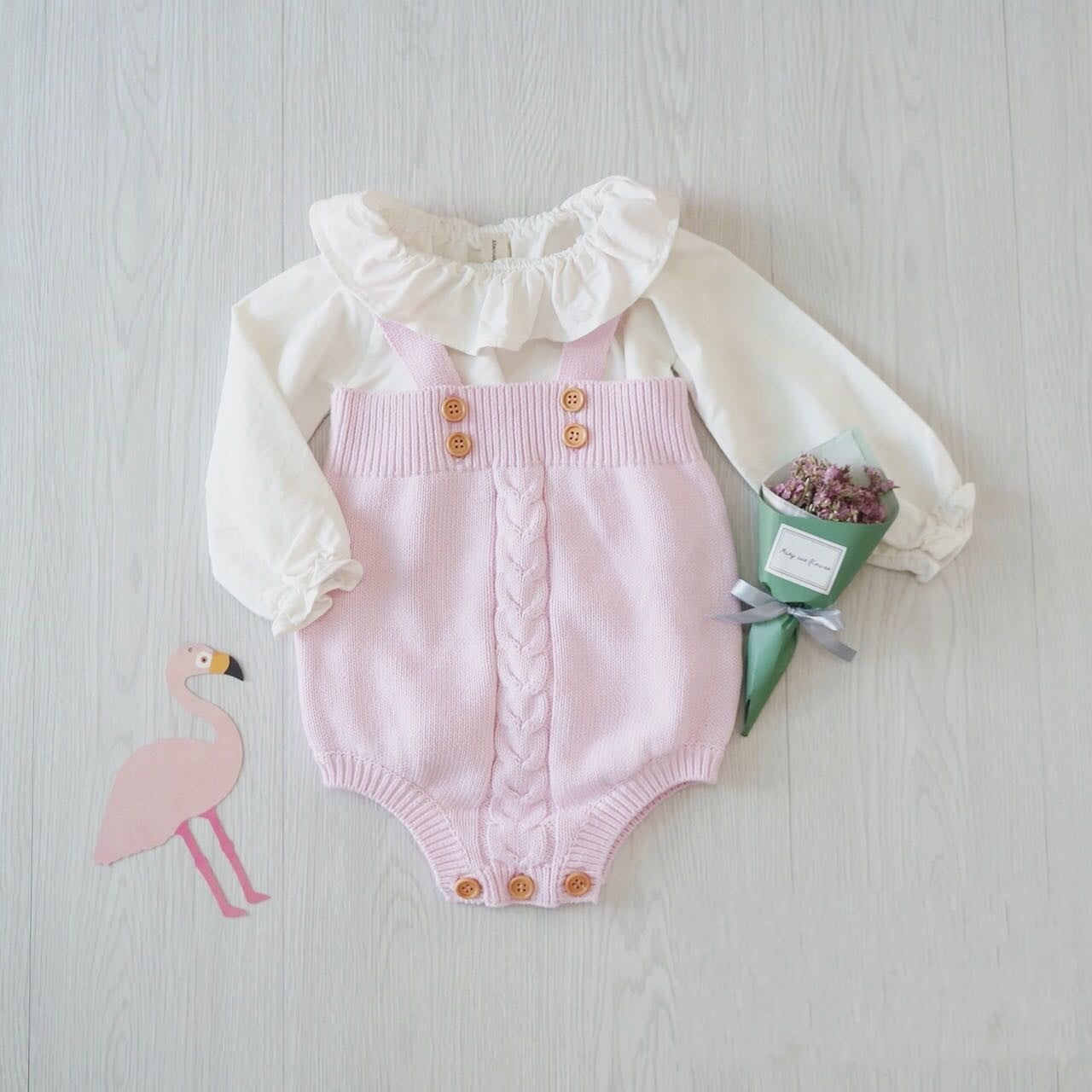Hand-Knitted Baby Onesie